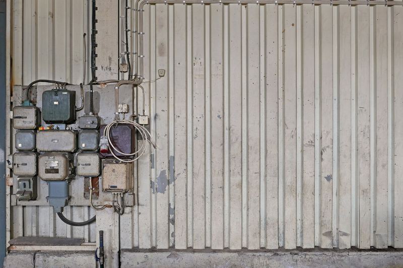 Distribution board mounted on a workshop wall